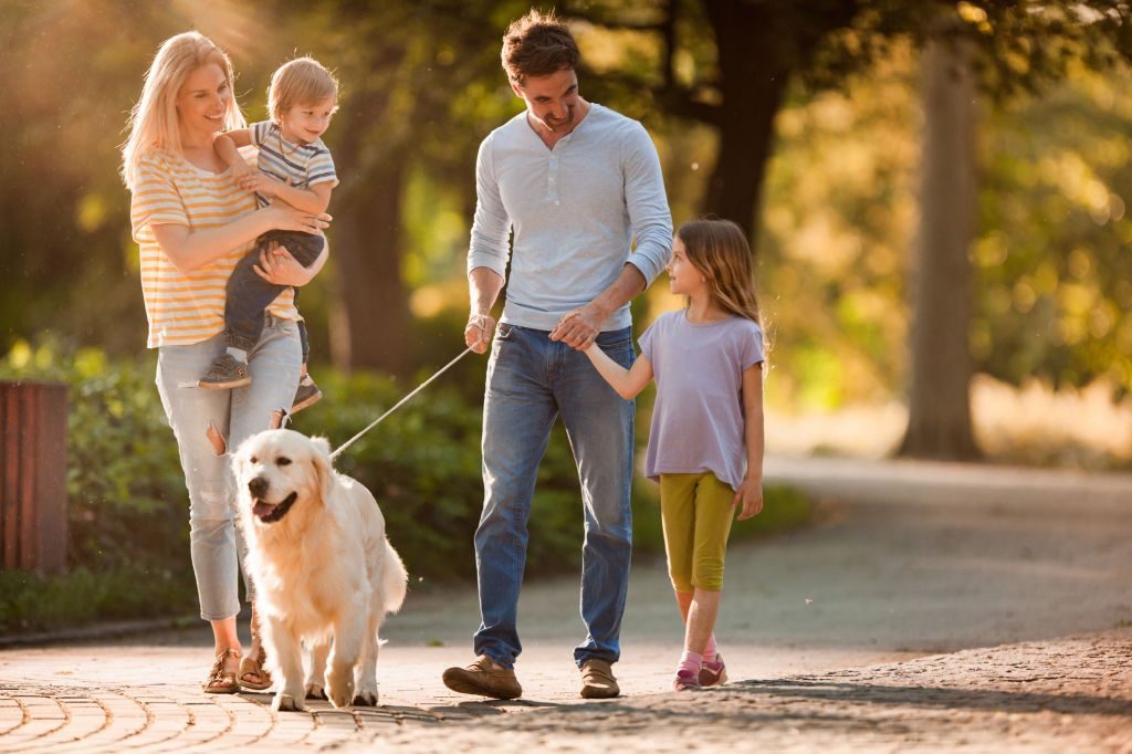 Family with dog in the park